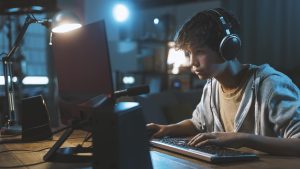a gamer at his desk